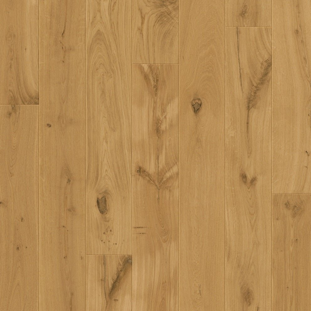 Quick-Step Palazzo hard wood flooring planks with a warm natural wood finish, showcasing the detailed grain and smooth surface.