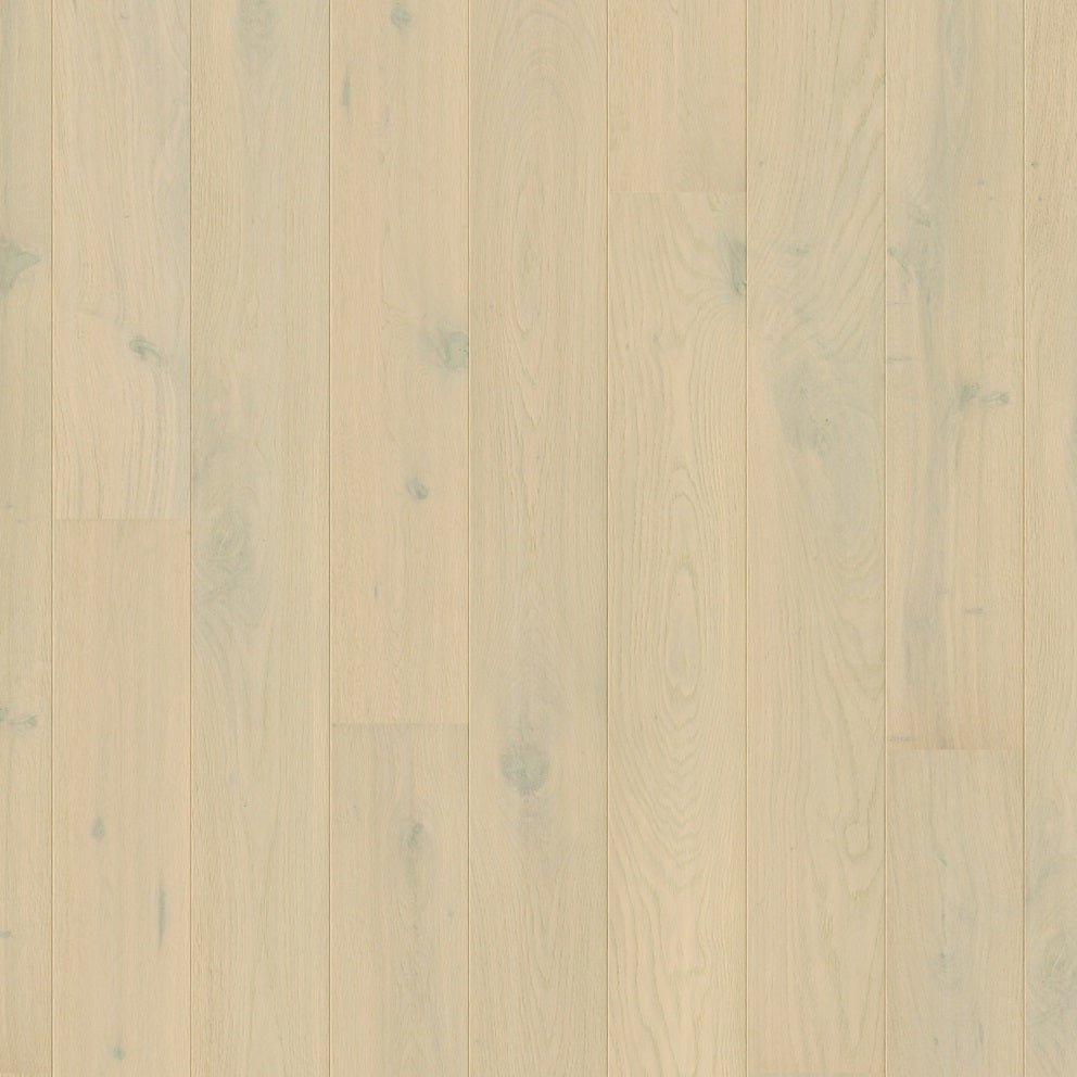 Quick-Step Amato hard wood flooring planks showcasing rich wood grain and smooth finish on a polished surface.