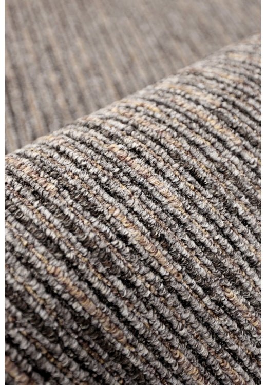 Surefit Carpets Geneva Multistripe Rug featuring multicolored striped pattern on plush fabric for home decor.