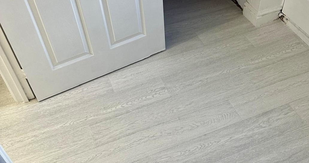Athena Sheet vinyl fitted in Kitchen and utility areas. - Surefit Carpets