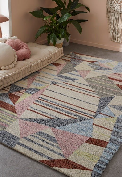 Surefit Carpets Contours Deco Rug with geometric pattern in neutral tones, showcasing soft, textured woven surface.