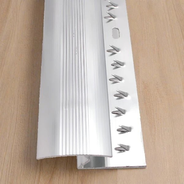 Surefit Carpets zig zag carpet trim door bar for secure and stylish flooring transitions, shown in close-up detail.