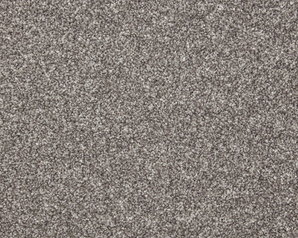 Inglewood Saxony carpet by Cormar Carpet Co featuring plush, soft beige fibers in a close-up texture shot