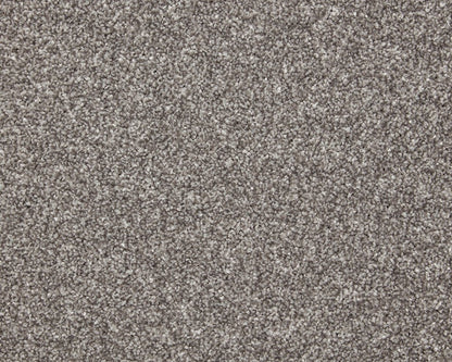 Inglewood Saxony carpet by Cormar Carpet Co featuring plush, soft beige fibers in a close-up texture shot