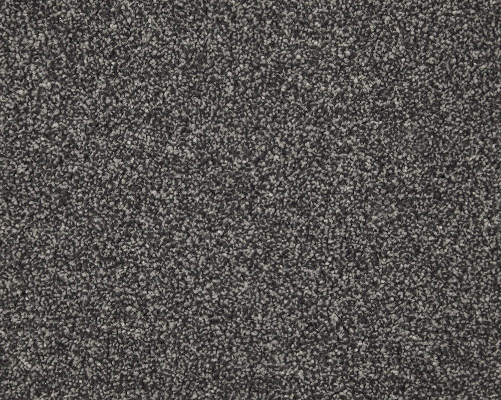 Inglewood Saxony carpet by Cormar Carpet Co, close-up of soft, plush beige textile with intricate pattern and textured surface.