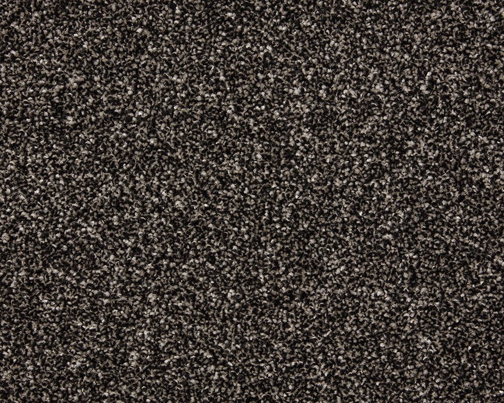 Close-up of Inglewood Saxony Carpet by Cormar Carpet Co showing soft, plush textured surface in neutral tones.