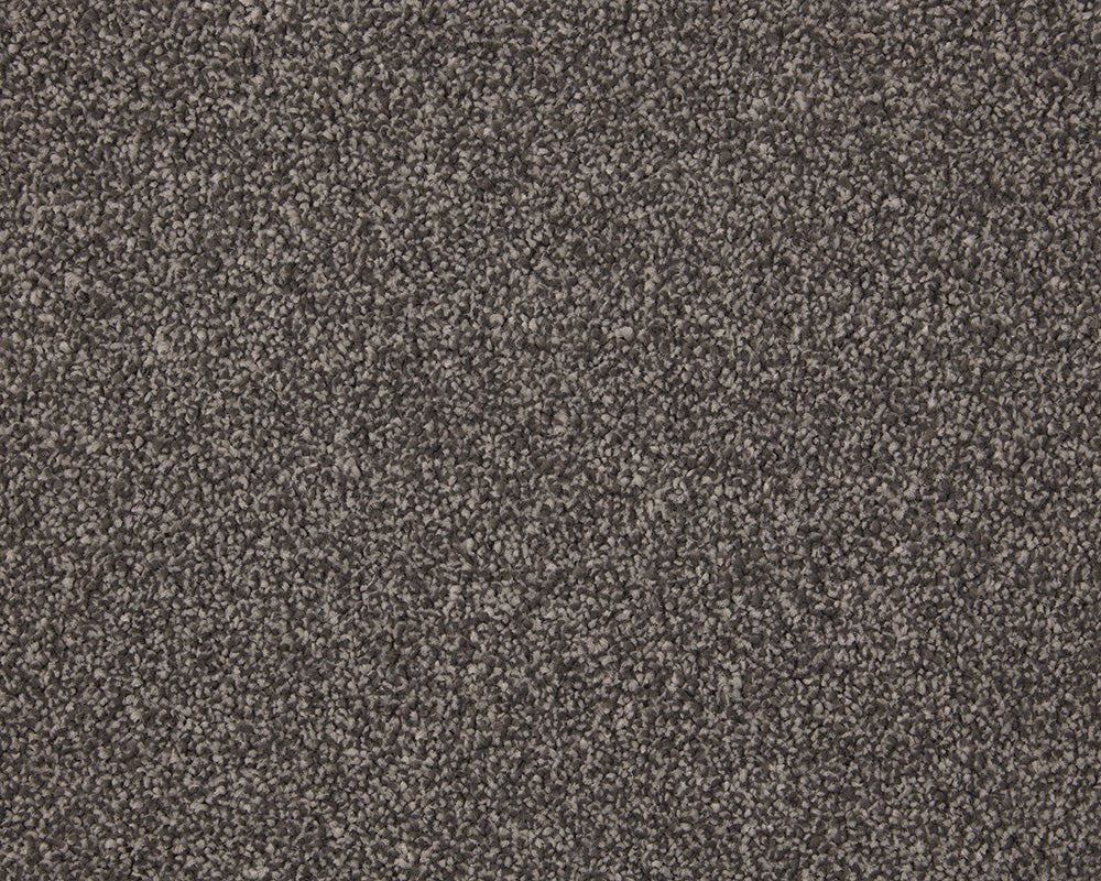 Inglewood Saxony Carpet by Cormar Carpet Co featuring plush, textured pile in warm neutral tones, perfect for living room flooring.