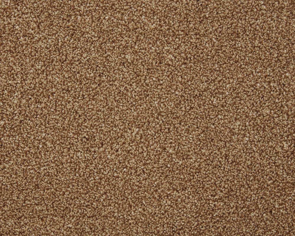 Inglewood Saxony carpet by Cormar Carpet Co featuring plush, textured cream-colored fibers in a close-up view.