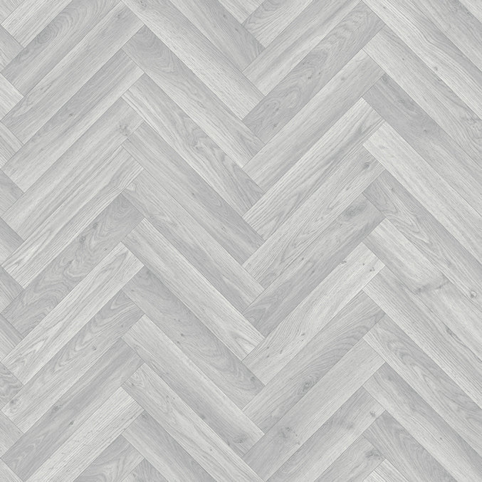 Lifestyle Floors Baroque Dawn Herringbone vinyl flooring with a warm, intricate herringbone pattern and textured surface.