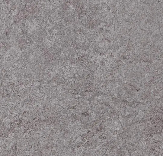 Novilon Viva Stone vinyl flooring by Forbo featuring a realistic stone pattern and durable surface for modern interiors.