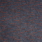 Heckmondwike Array Carpet Tiles showing a close-up of gray textured tile surface for modern flooring design.
