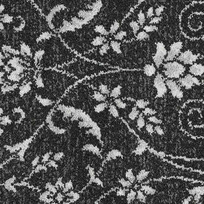 Abingdon Flooring Highgrove Stainfree Wilton carpet with intricate floral pattern and plush texture, shown in a well-lit room setting.