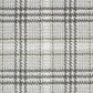 Abingdon Flooring Chequers Stainfree Wilton Carpet with a checkered pattern in neutral tones, suitable for living rooms or bedrooms.