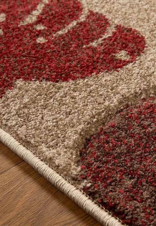 Oriental Weavers Portland Rug 7155Q showcasing a modern geometric pattern in neutral tones, suitable for living room or bedroom decor.