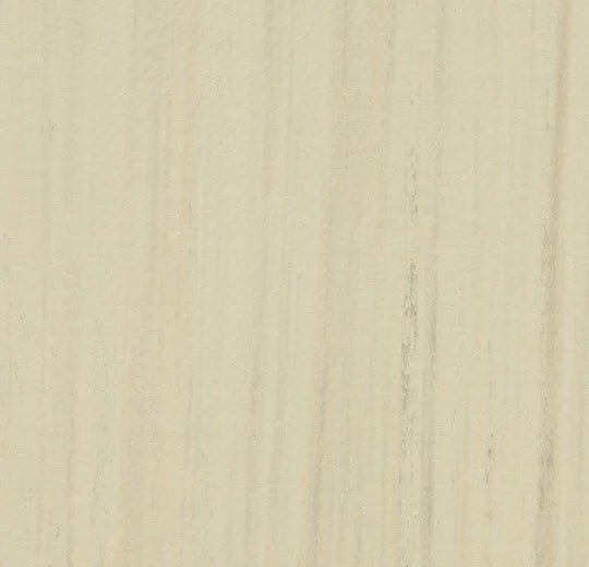 Forbo Marmoleum Modular Planks in 100x25cm, green and beige interlocking flooring tiles arranged in a pattern