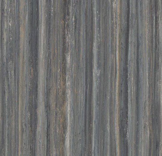 Forbo Marmoleum Modular Planks in 100x25cm, showcasing natural linoleum flooring with a textured, earthy appearance