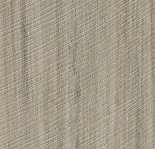 Forbo Marmoleum Modular Planks 100x25cm flooring, showing beige and brown patterned linoleum planks laid in a room.