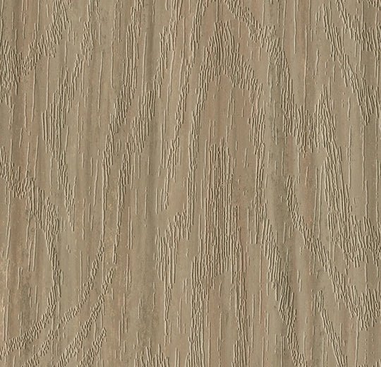 Forbo Marmoleum modular planks in 100x25cm, showcasing natural linoleum flooring with a wood-like pattern and warm tones.