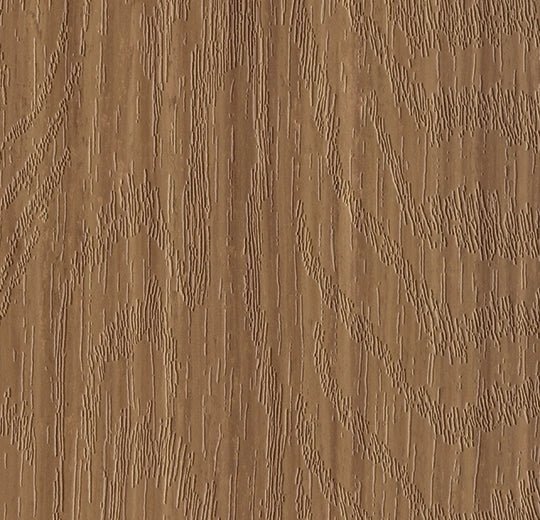 Forbo Marmoleum Modular Planks flooring in 100x25cm, showing brown and beige interlocking linoleum tiles on a floor surface.