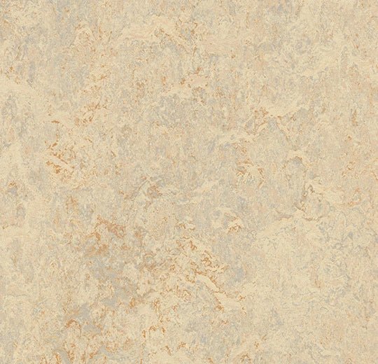 Forbo Marmoleum modular tiles in 50x50cm size arranged on flooring, showcasing eco-friendly Marmoleum flooring in natural shades.
