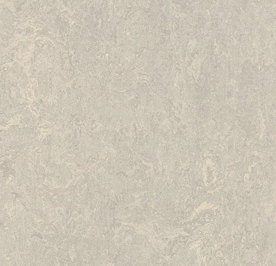 Forbo Marmoleum modular tiles in 50x50cm size, showing colorful, patterned flooring tiles with a textured surface.