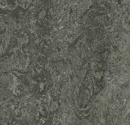 Forbo Marmoleum modular tiles in 50x50cm, showcasing green and beige patterned flooring tiles.