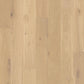 Quick-Step Palazzo hard wood flooring with warm oak planks, showcasing smooth, polished surface and natural wood grain details.