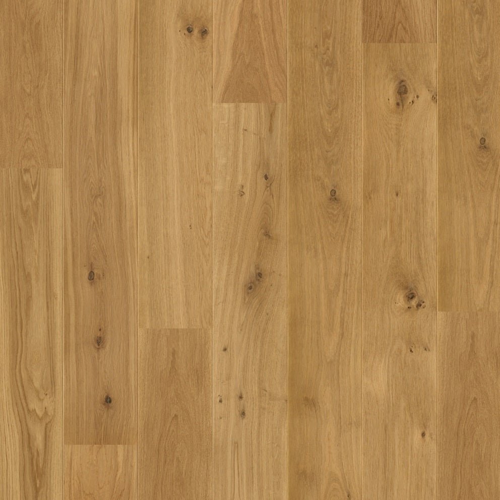 Quick-Step Palazzo hardwood flooring planks showcasing natural wood grain and rich color for elegant home flooring.