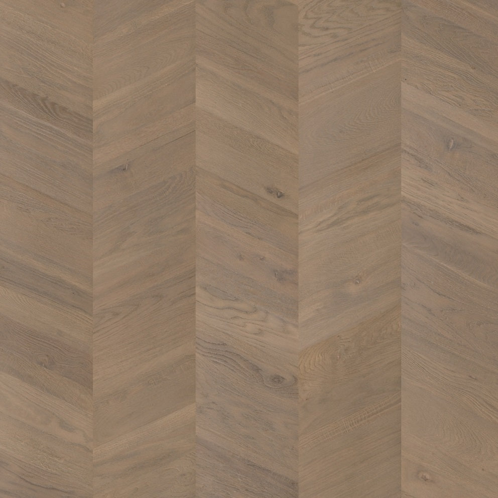 Close-up of Quick-Step Intenso hard wood flooring showing rich oak planks with a smooth, polished finish.