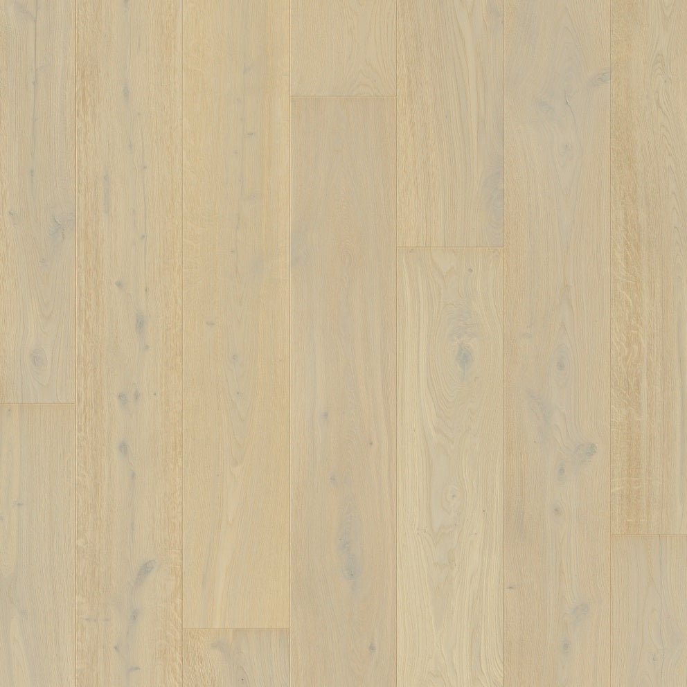 Quick-Step Massimo hard wood flooring planks showing a natural oak finish and smooth surface texture.