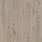 Close-up of Quick-Step Massimo hardwood flooring planks showcasing their rich wood grain and smooth finish.