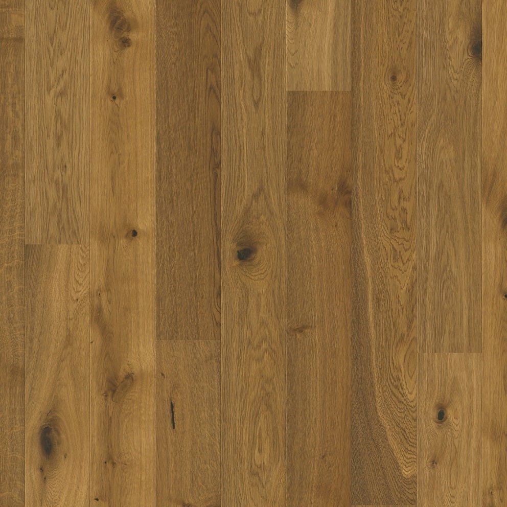 Quick-Step Amato hard wood flooring planks showcasing natural wood grain and warm brown tones for elegant interior decor
