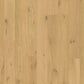 Quick-Step Amato hard wood flooring planks with a natural wood finish and smooth surface, showcasing durable hardwood flooring.