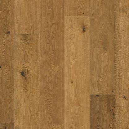 Quick-Step Cala hard wood flooring planks with natural wood grain and warm finish, showcasing durable hardwood surface.