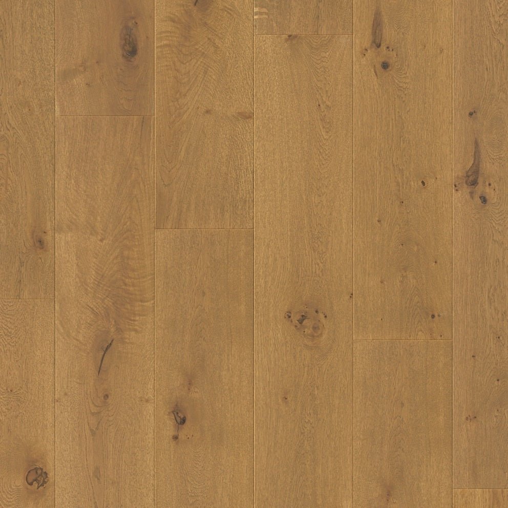 Quick-Step Cala hardwood flooring planks with a natural wood finish, showcasing the durable, stylish hard wood flooring option.