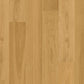 Quick-Step Cala hard wood flooring planks with a natural oak finish, showcasing smooth surface and textured wood grain.
