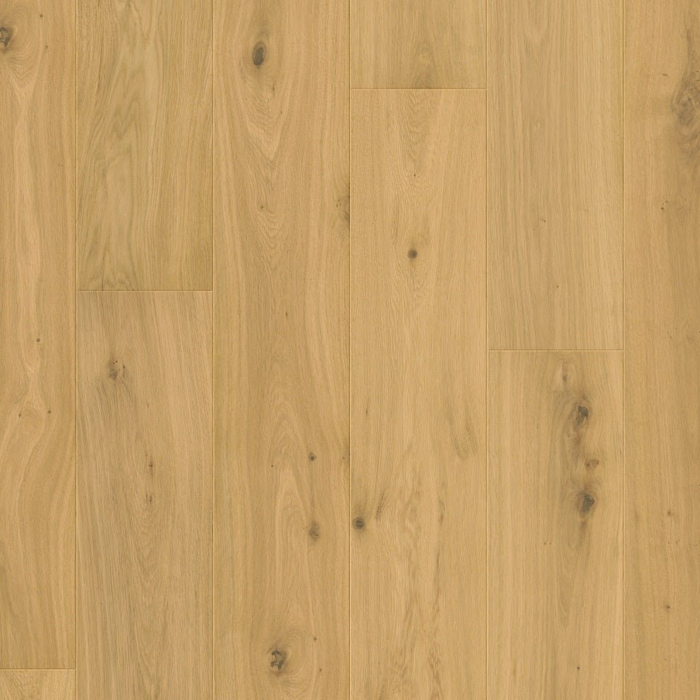 Quick-Step Cala hard wood flooring planks with natural wood grain finish, showcasing their rich color and smooth surface.