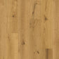 Quick-Step Cala hardwood flooring planks with a natural wood finish, showcasing the durable and stylish hard wood flooring design.