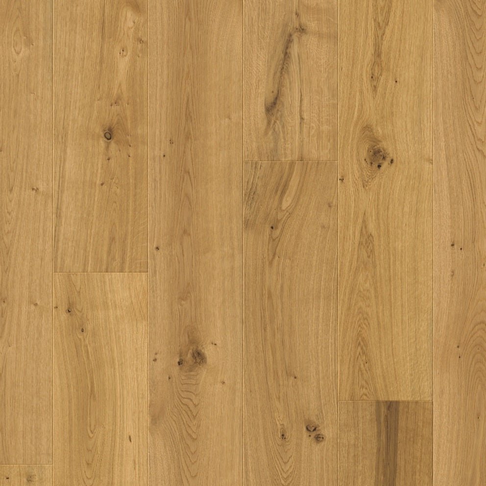 Quick-Step Cala hardwood flooring planks with a natural wood finish, showcasing the durable and stylish hard wood flooring design.
