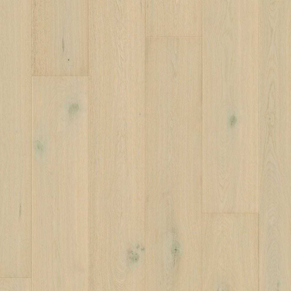 Quick-Step Cala hard wood flooring planks showcasing smooth, natural wood grain with a warm, light finish for elegant interior design.