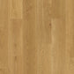 Quick-Step Cascada hard wood flooring planks with a natural wood grain finish, showcasing the durable hardwood surface.