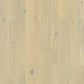 Quick-Step Cascada hardwood flooring planks showcasing natural wood grain and warm tones for elegant interior design.