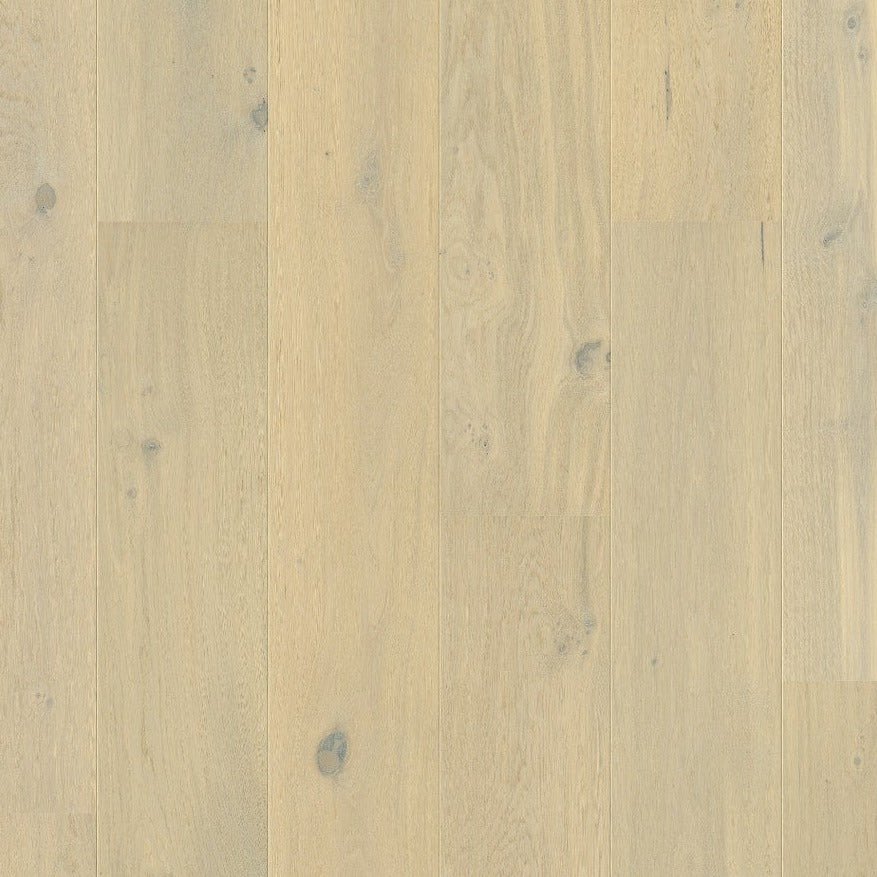 Quick-Step Cascada hardwood flooring planks showcasing natural wood grain and warm tones for elegant interior design.