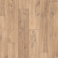 Quick-Step Classic laminate flooring planks with a wood grain finish, showcasing the durable and stylish flooring option.