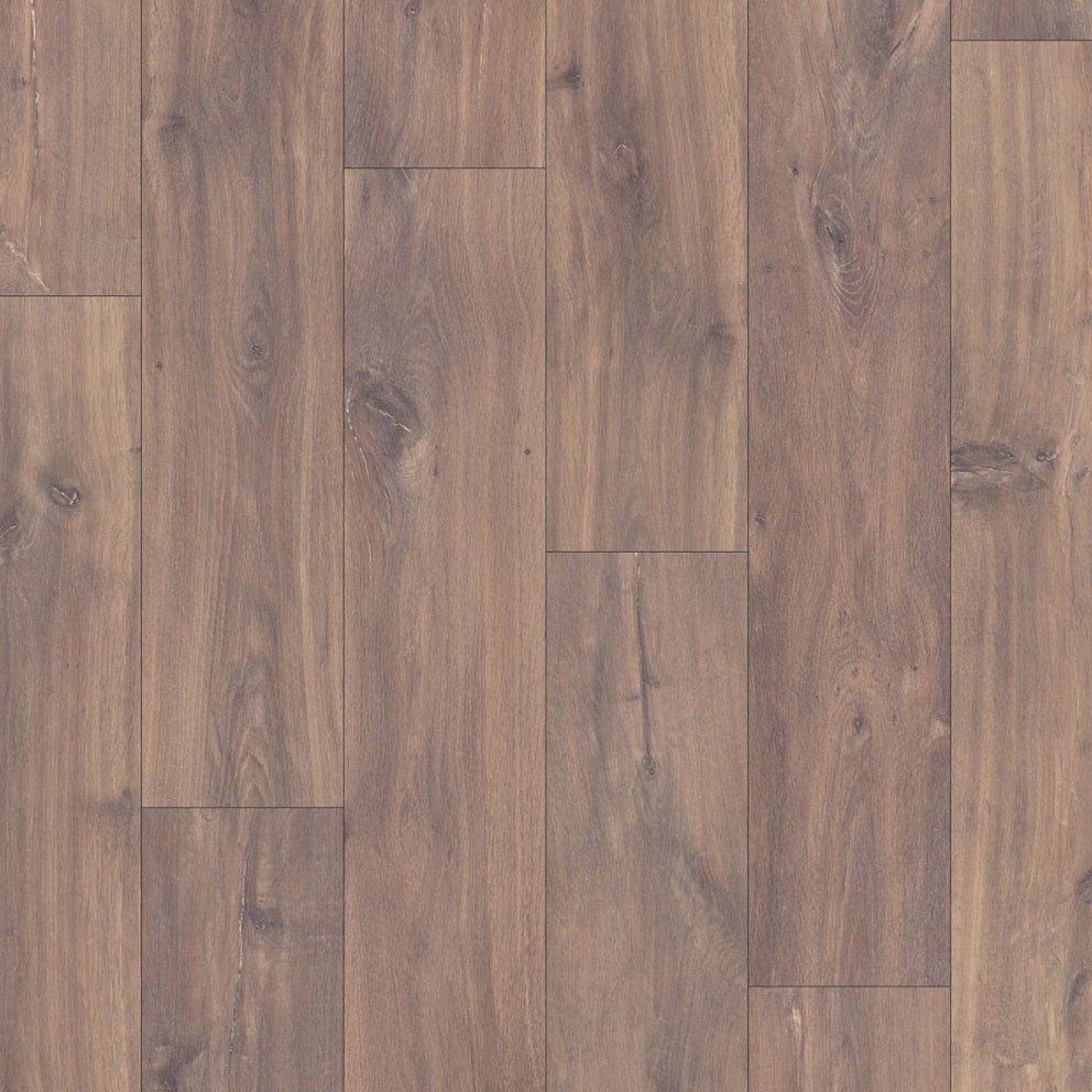 Quick-Step Classic laminate flooring planks with a natural wood finish, showcasing the durable and stylish flooring option.