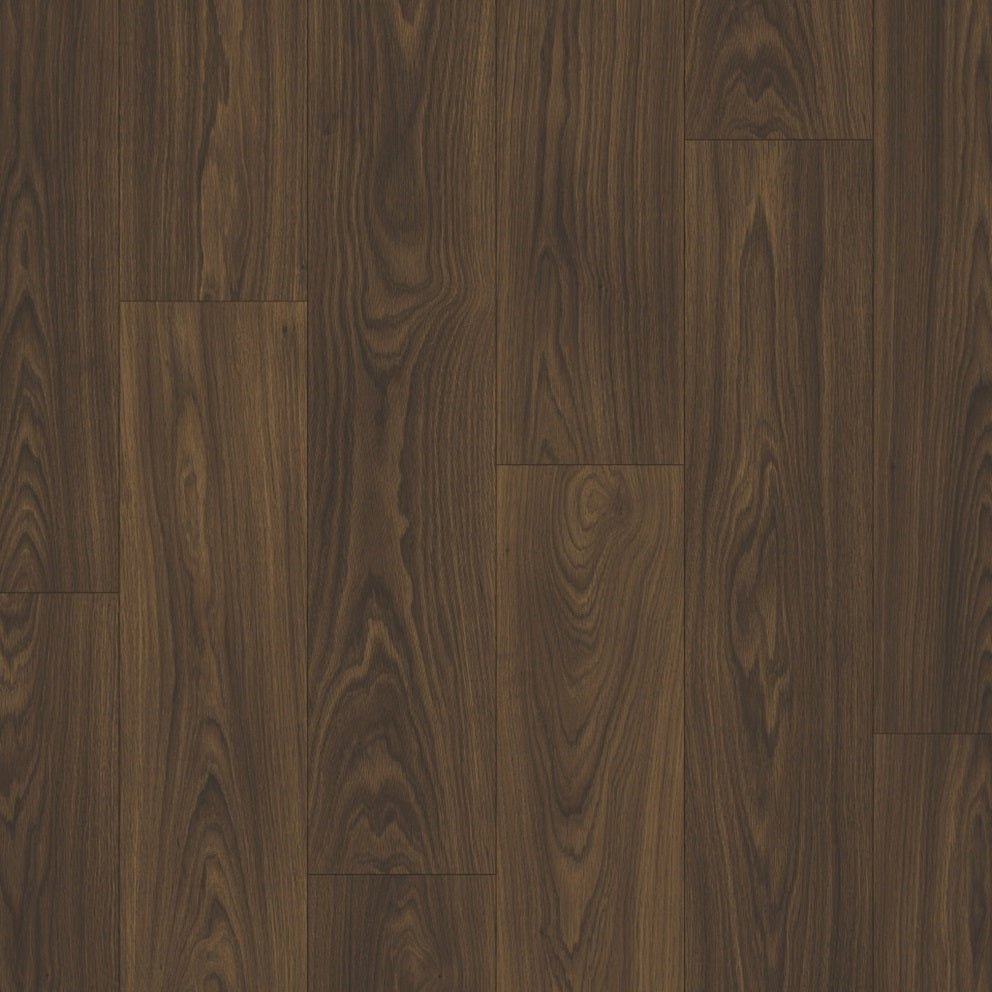 Quick-Step Classic laminate flooring planks with a wood grain finish, showing their durable surface and natural light brown color.