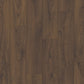 Quick-Step Classic laminate flooring planks showcasing wood grain texture and natural finish for durable home flooring.