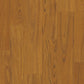 Quick-Step Classic laminate flooring planks with a natural wood finish, showcasing the textured surface and light brown color.