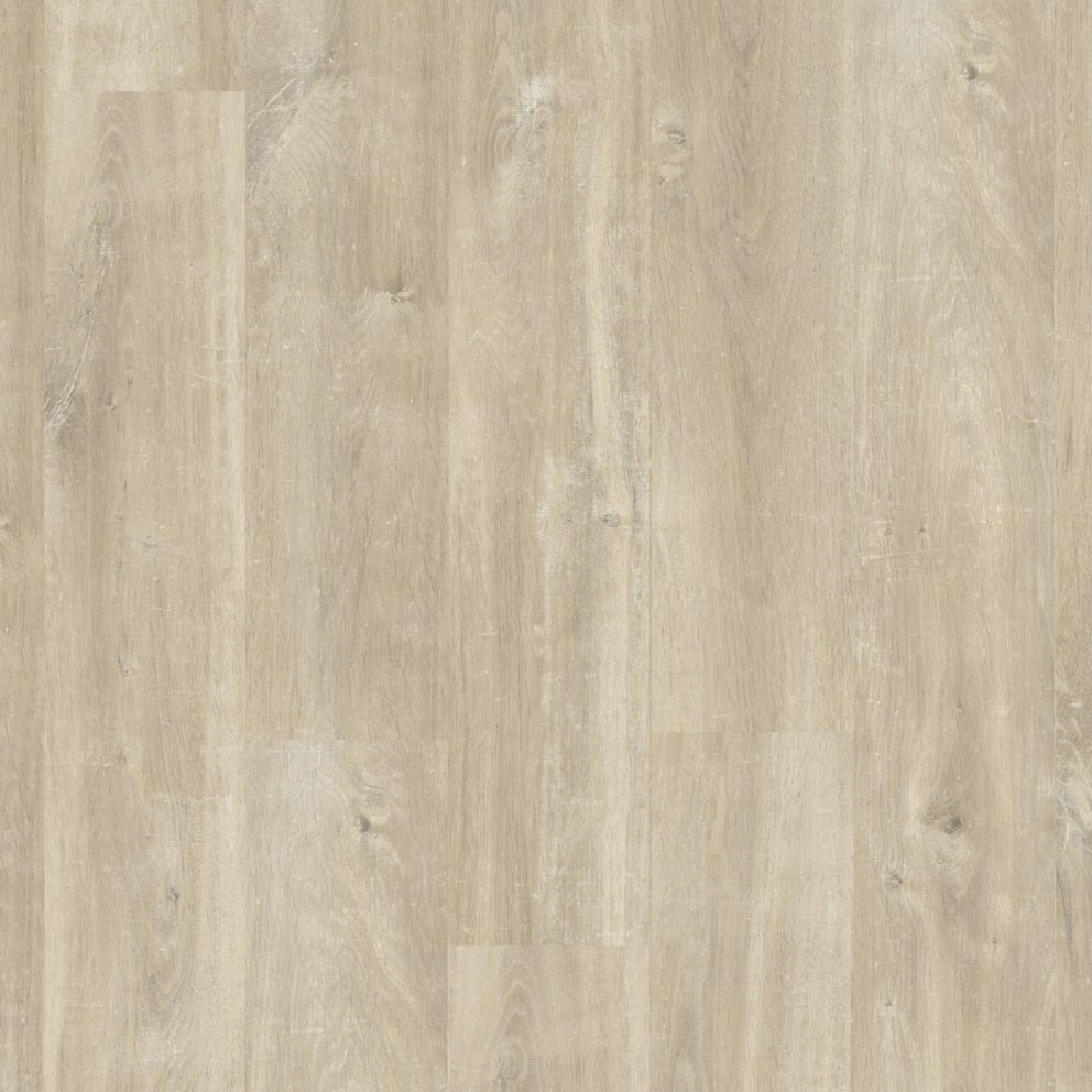 Quick-Step Creo laminate flooring planks with a light wood grain finish, showcasing the flooring's texture and natural appearance.