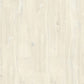 Quick-Step Creo laminate flooring planks showing wood grain texture and natural finish in a close-up view.